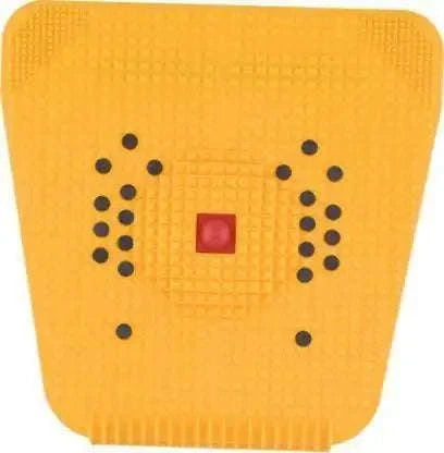 Yellow acupressure mat with raised nubs and dot grid patterns